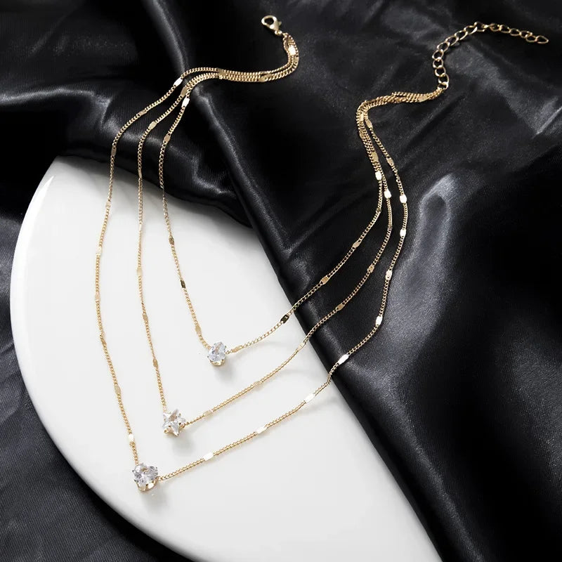 Collier multicouche triple avec pendentifs en zircon