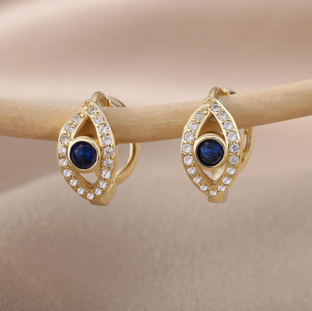 Boucles d'oreilles bouton en plaqué or 18 carats contre le mauvais oeil
