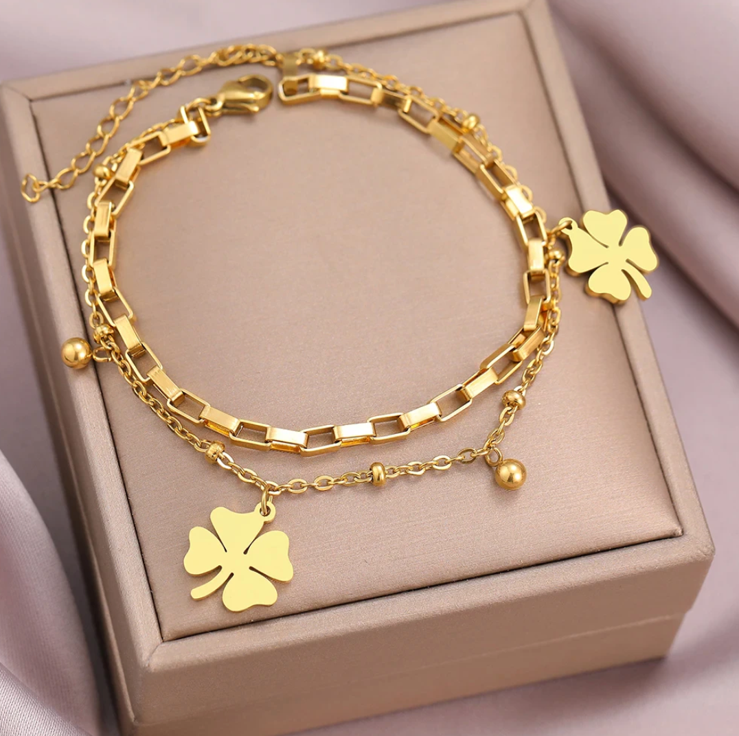 Double bracelet plaqué or 18 carats avec trèfles porte-bonheur