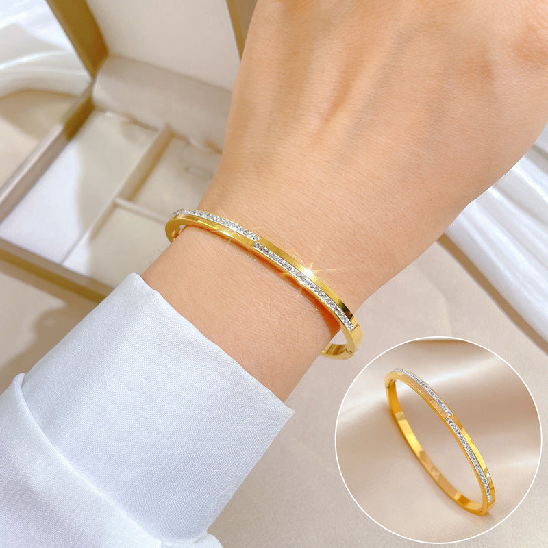 Bracelet rigide cristal doré Aera
