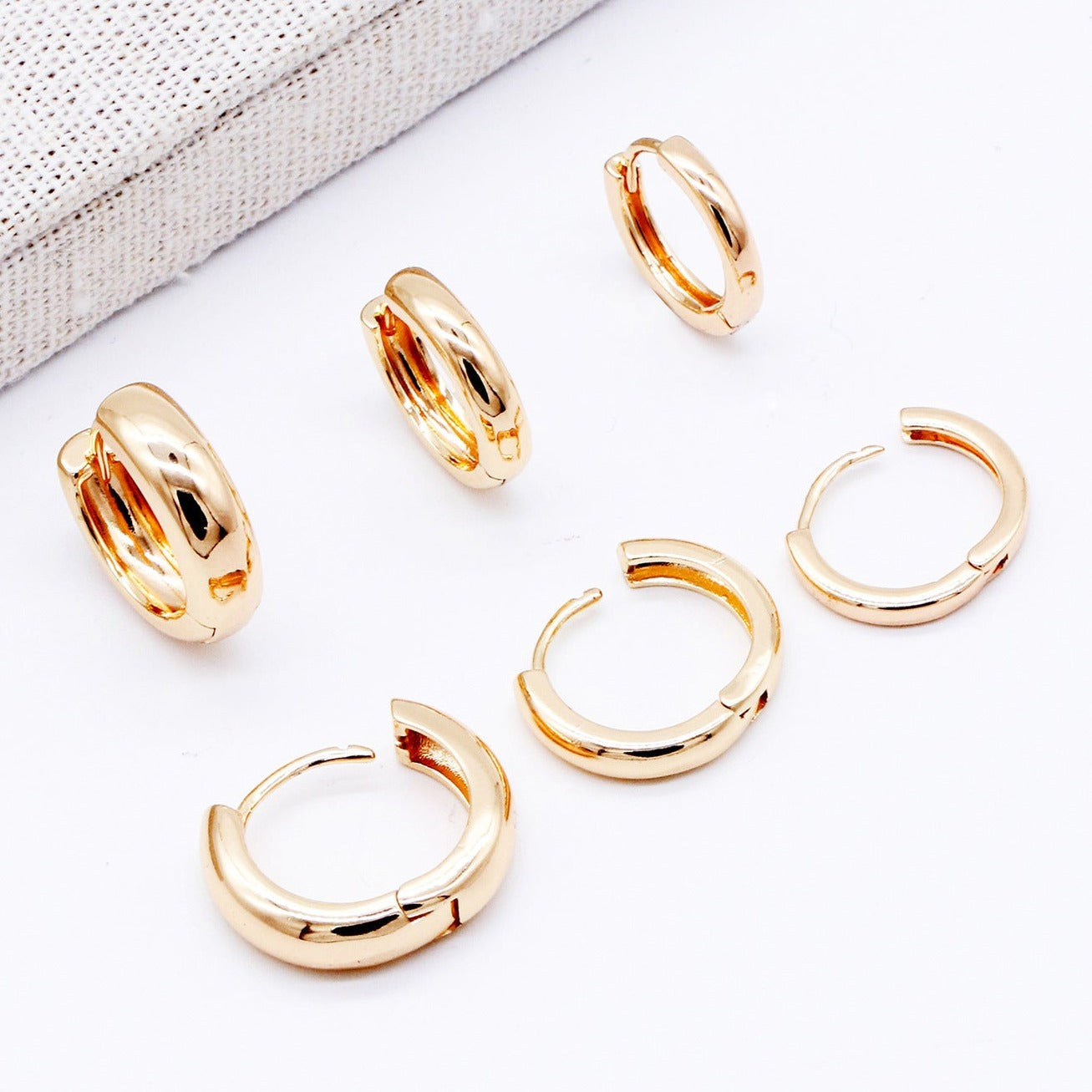 Boucles d'oreilles anneau enveloppant dorés Aurelia