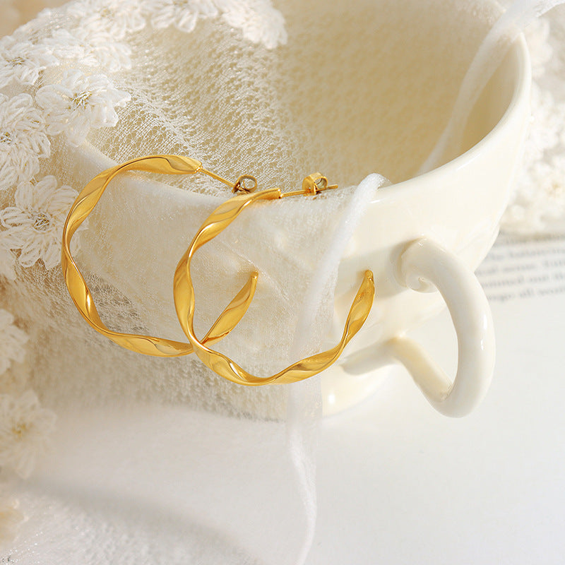 Boucles d'oreilles dorés Iris