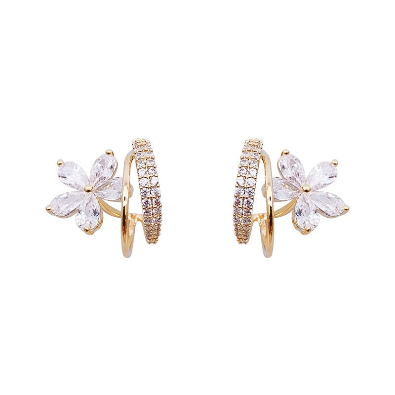 Boucles d'oreilles florales avec zircon en or