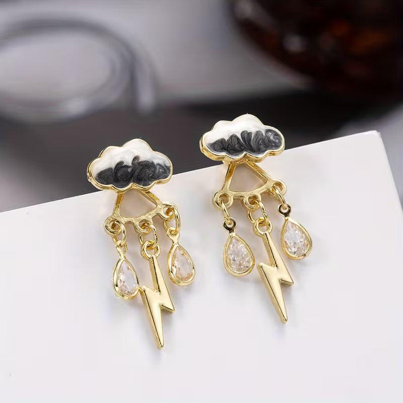 Boucles d'oreilles pendantes élégantes nuage avec pompons