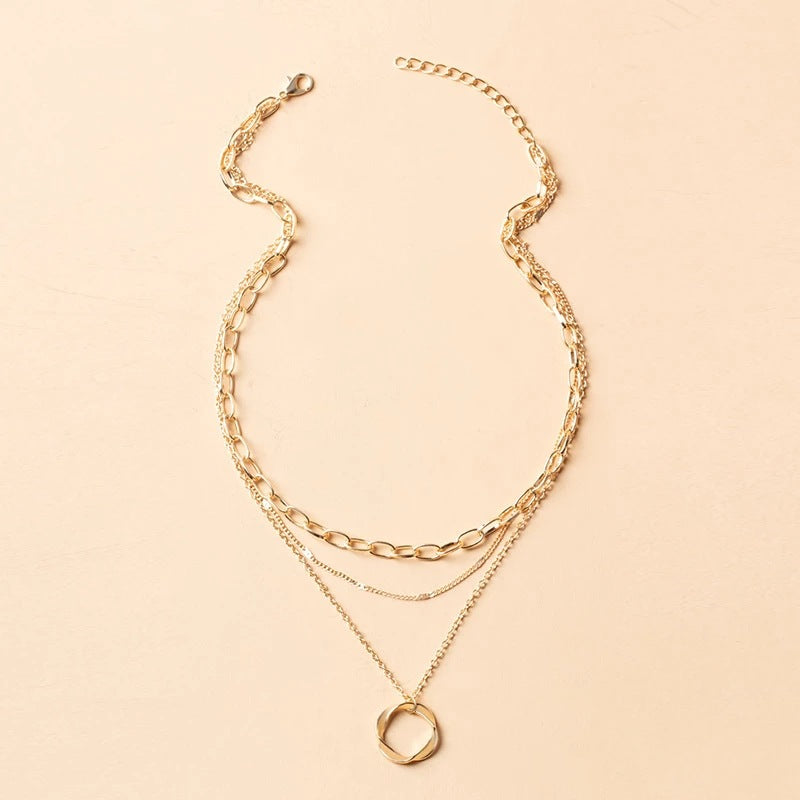 Collier vintage chaînes superposées avec pendentif