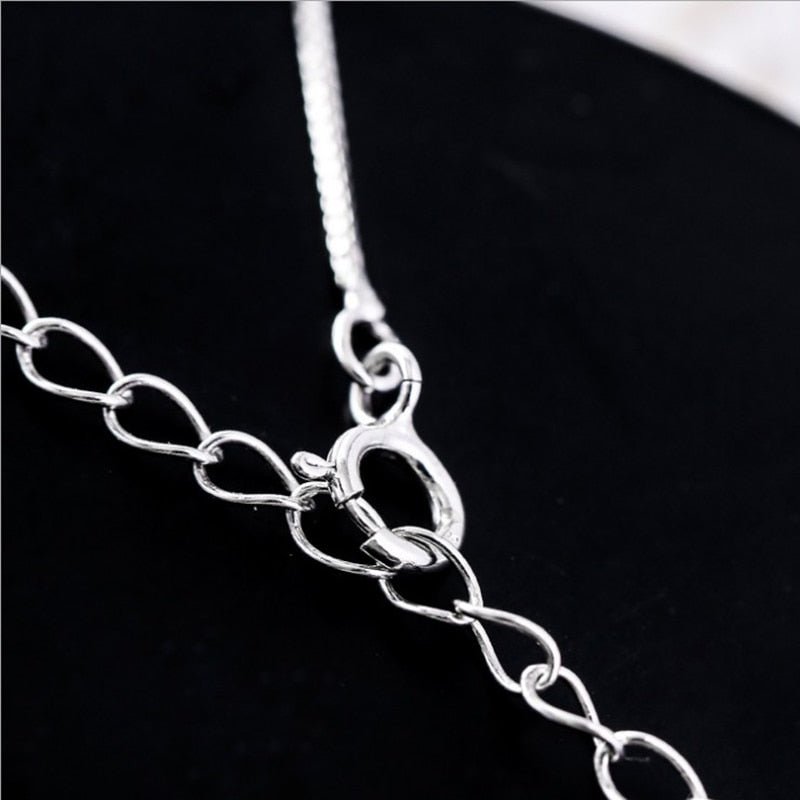 Collier chat élégant croissant et chat