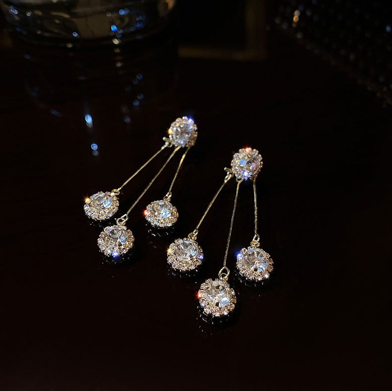 Boucles d'oreilles plaquées or Triade de zircones