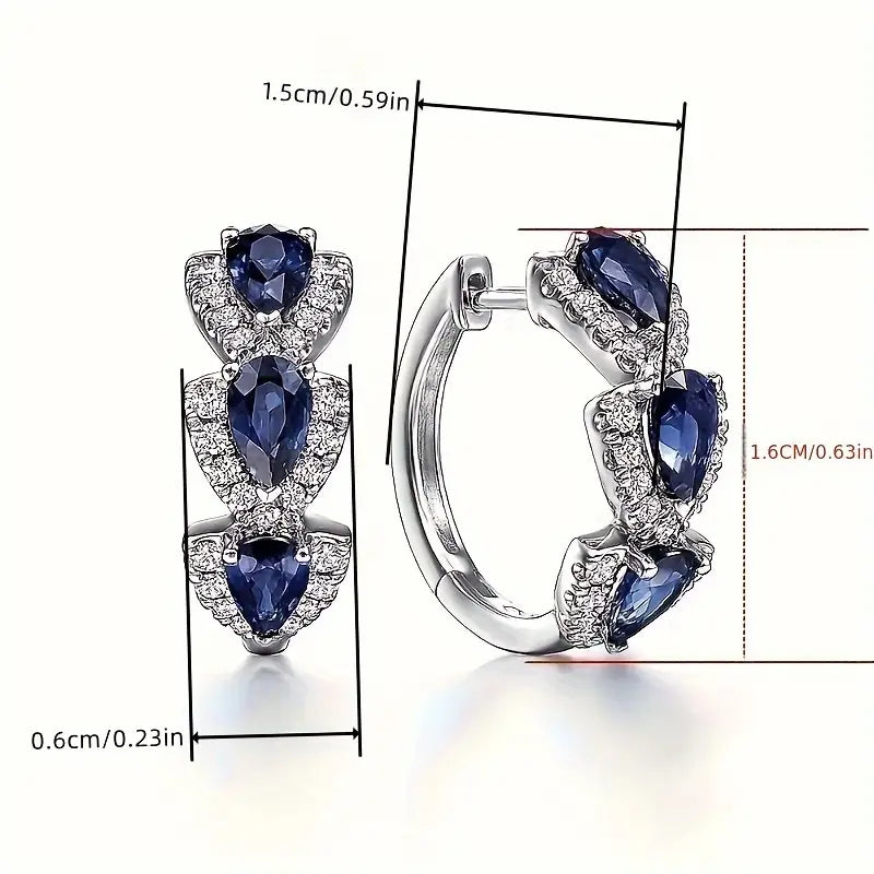 Boucles d'oreilles blason royal en saphir | Or Blanc