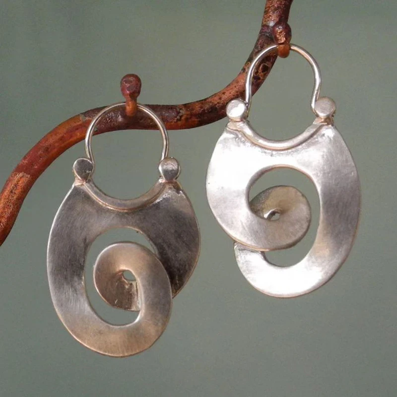 Boucles d'oreilles argentées irrégulières