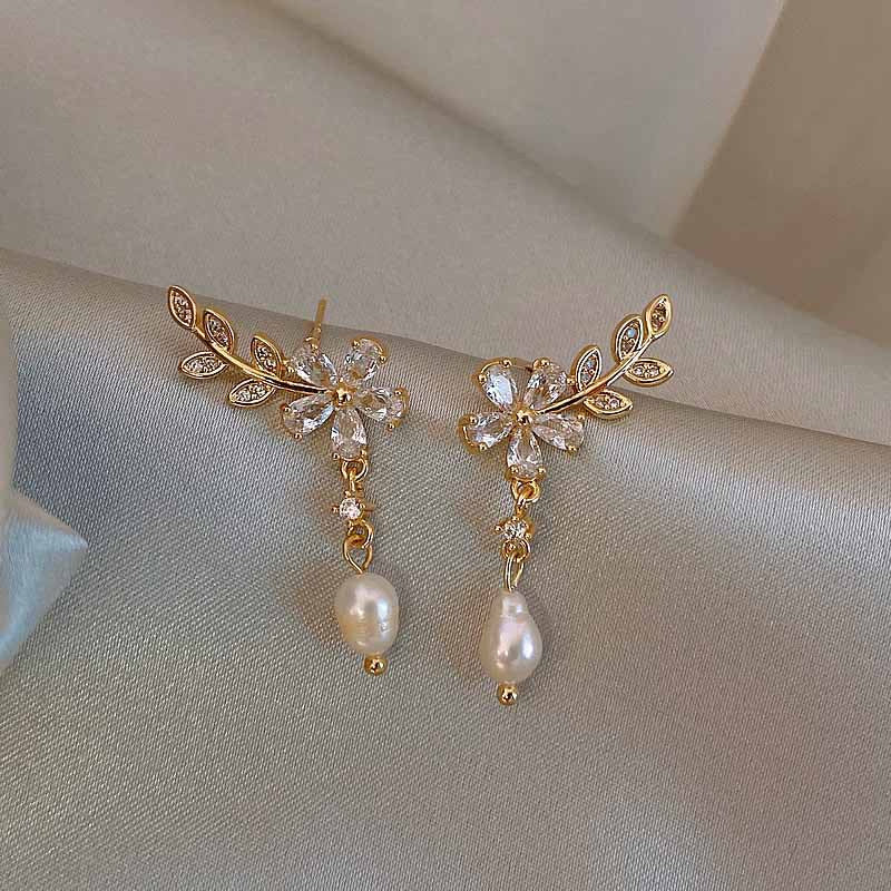 Boucles d'oreilles marguerite avec perles faites à la main