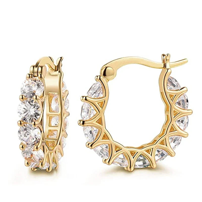 Boucles d'oreilles vintage avec zircons dorées