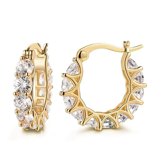 Boucles d'oreilles vintage avec zircons dorées
