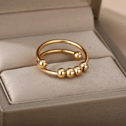 Bague rotative calme anti-stress avec billes