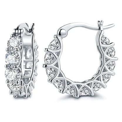 Boucles d'oreilles vintage avec zircons dorées