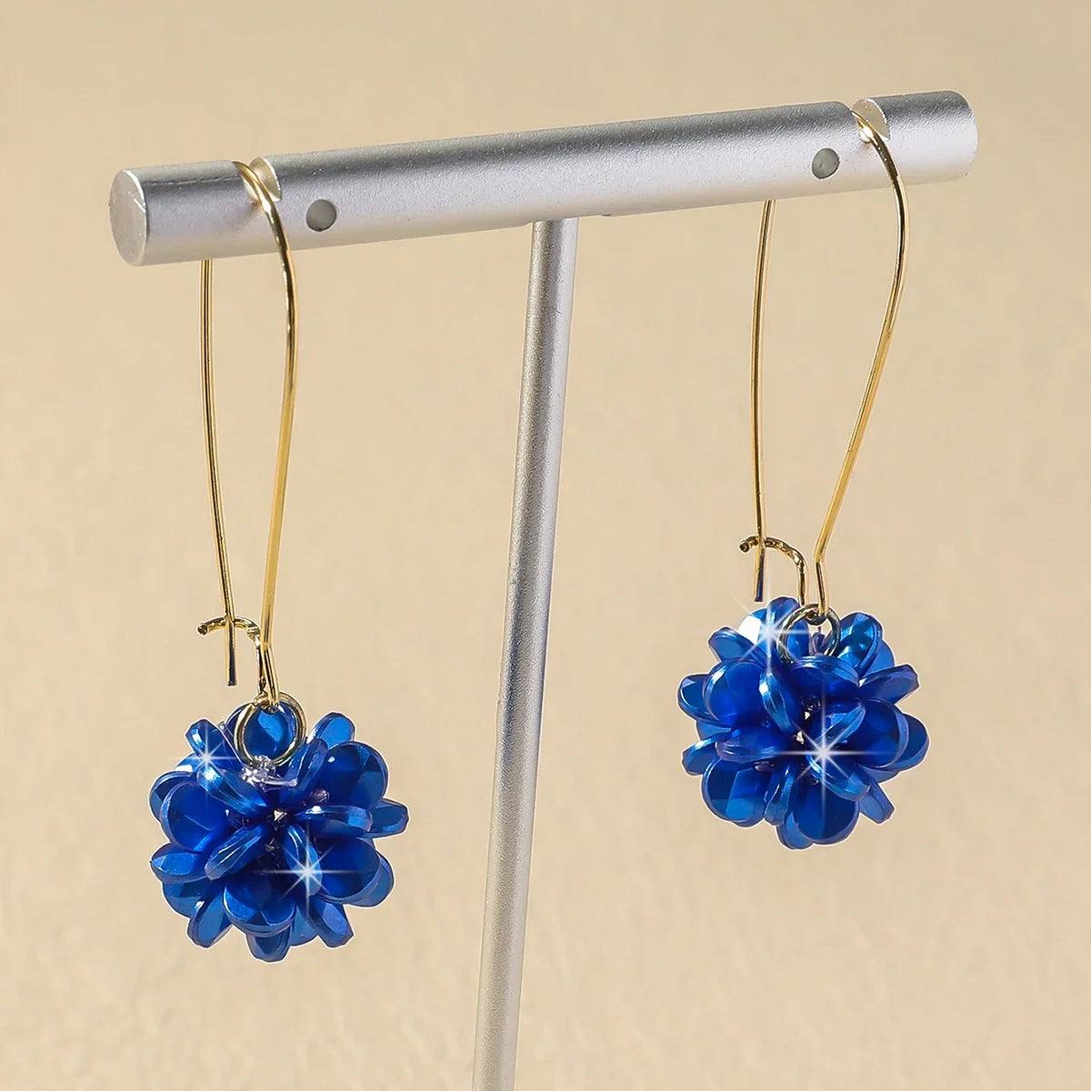 Boucles d'oreilles longues fleur de perle
