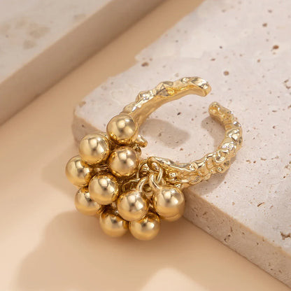 Bague ajustable à sphères dorée