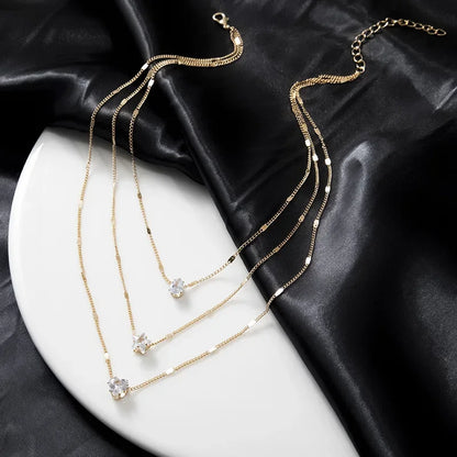 Collier multicouche triple avec pendentifs en zircon