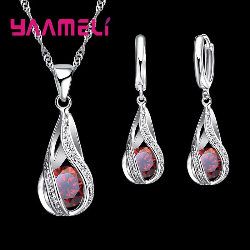 Ensemble collier et boucles d'oreilles goutte de rosée cristal