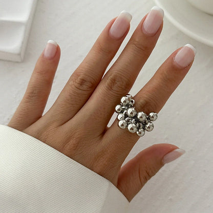 Bague ajustable à sphères dorée