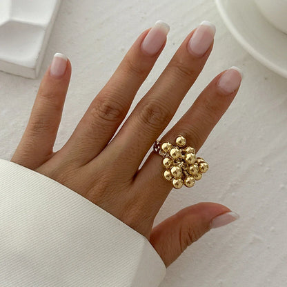 Bague ajustable à sphères dorée