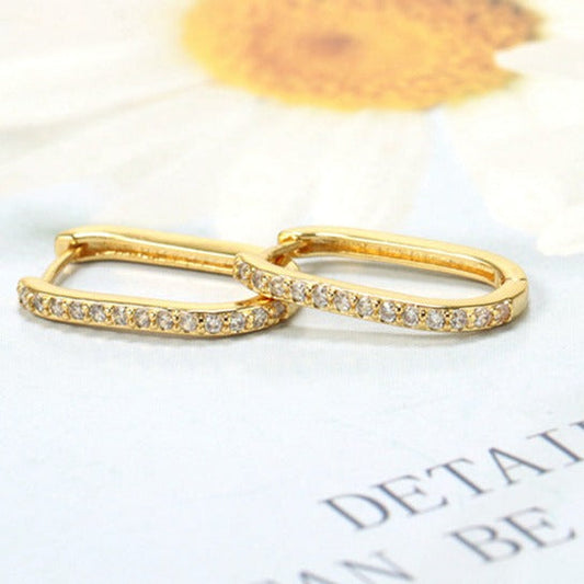 Boucles d'oreilles en U dorés Sirius