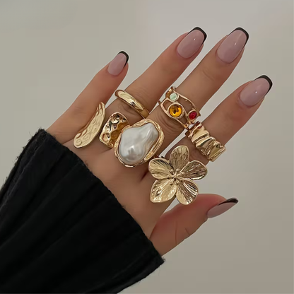 Ensemble de 6 bagues dorées en perles baroques