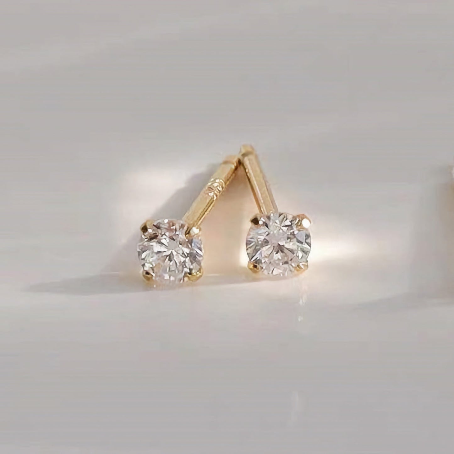 Petits boucles d'oreilles dorés Zeke