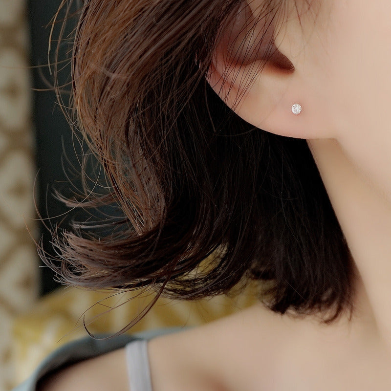 Petits boucles d'oreilles dorés Zeke