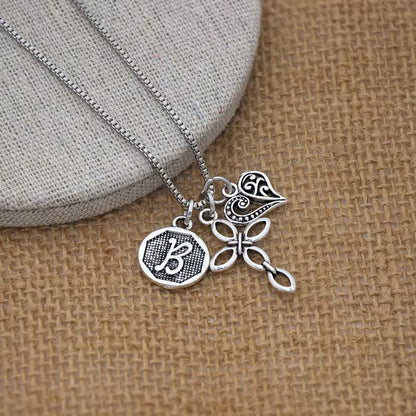 Collier Croix et cœur avec initiale