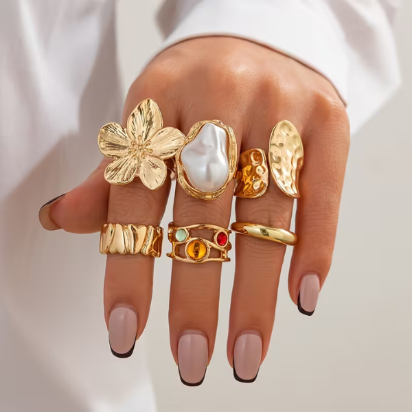 Ensemble de 6 bagues dorées en perles baroques