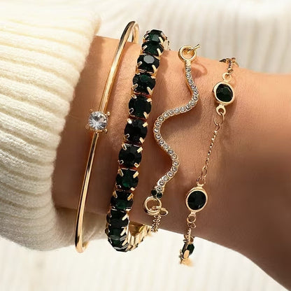 Ensemble de bracelets dorés avec pierres précieuses