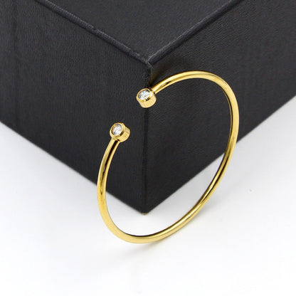Bracelet ouvert doré à cristaux jumeaux