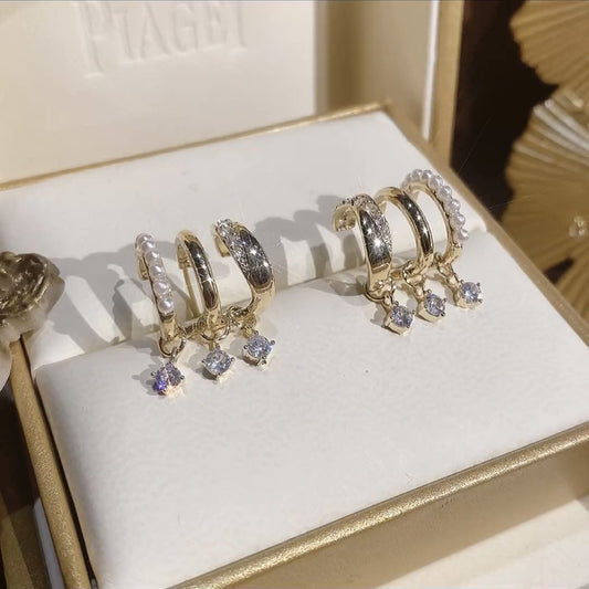 Boucles d'oreilles superposées incrustées de zircones
