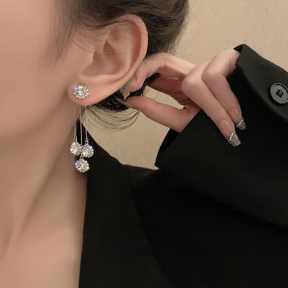 Boucles d'oreilles plaquées or Triade de zircones