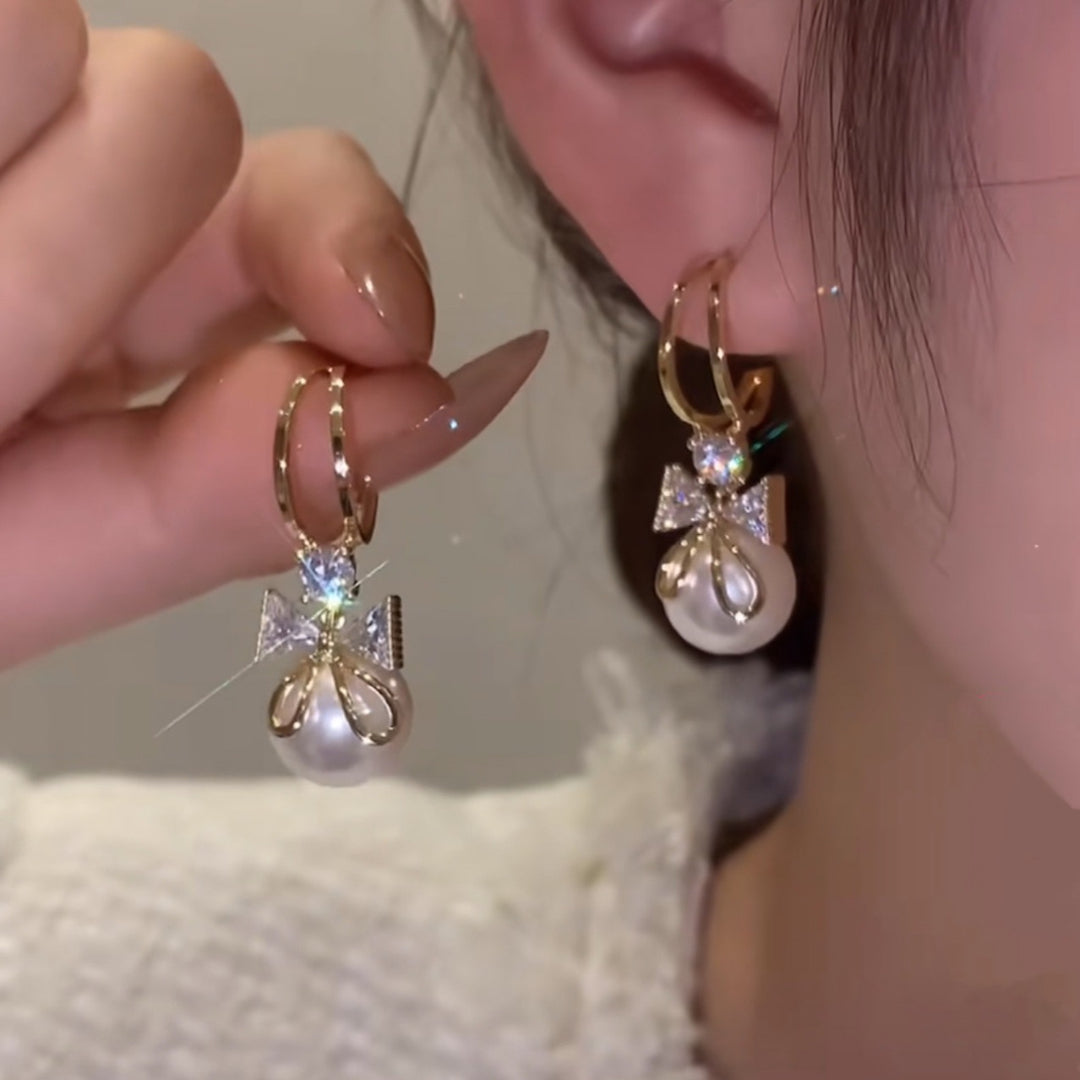 Boucles d'oreilles double nœud avec perles