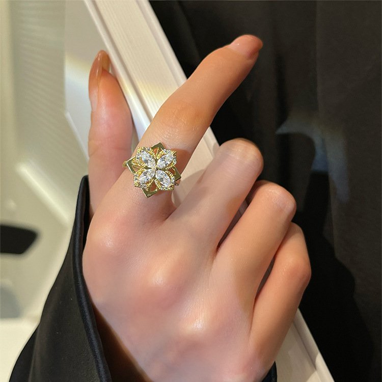 Set bague et collier tournants trèfle à quatre feuilles avec zircones