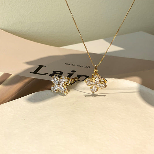 Set bague et collier tournants trèfle à quatre feuilles avec zircones