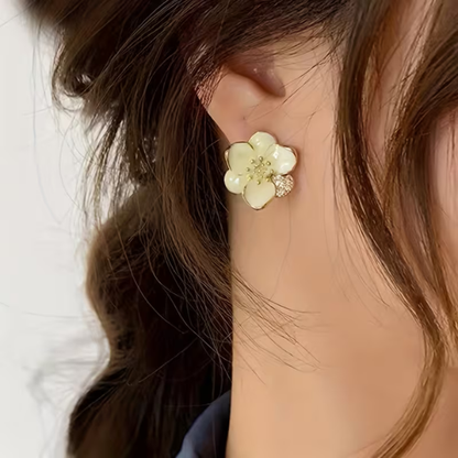 Boucles d'oreilles pendantes modernes élégantes en forme de fleur