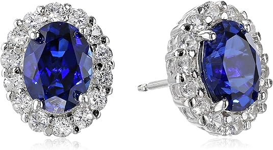 Boucles d'oreilles stud ovales en saphir blanc | Or Blanc