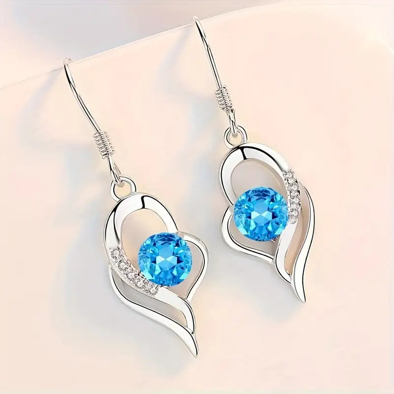 Boucles d'oreilles gouttes cœur éclipse | Or Blanc