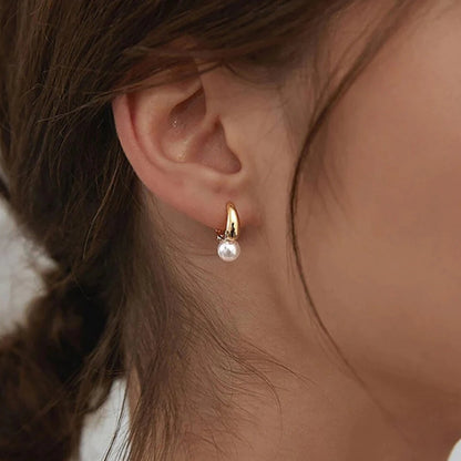 Boucles d'oreilles petites perles dorées