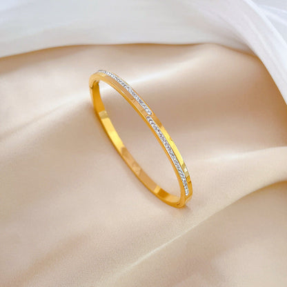 Bracelet rigide cristal doré Aera