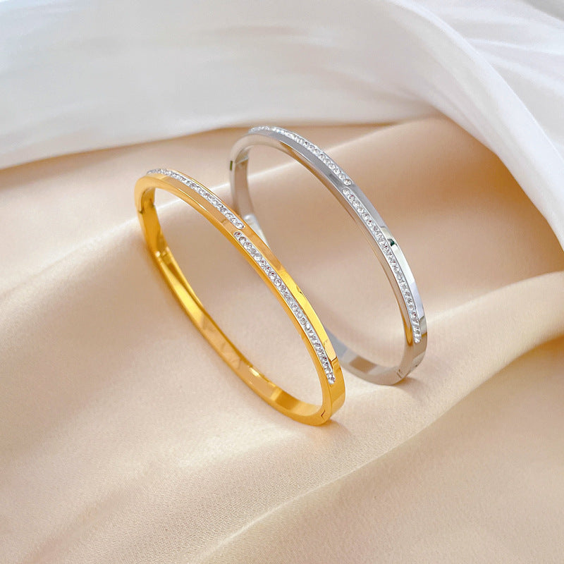 Bracelet rigide cristal doré Aera