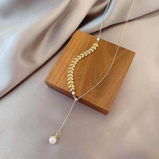 Collier de perles Tranquillité Dorée