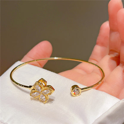 Bracelet tournant pétales brillants