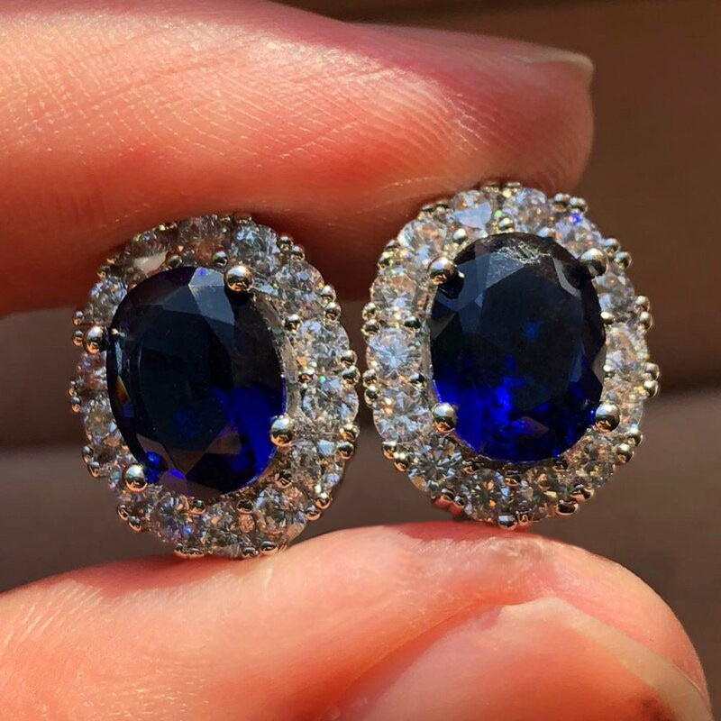 Boucles d'oreilles stud ovales en saphir blanc | Or Blanc