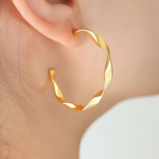 Boucles d'oreilles dorés Iris