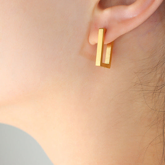 Boucles d'oreilles géométriques dorés Terra