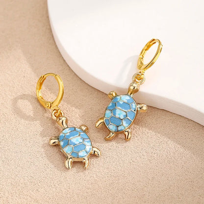 Boucles d'oreilles Huggie Tortue de Mer Charme Océan