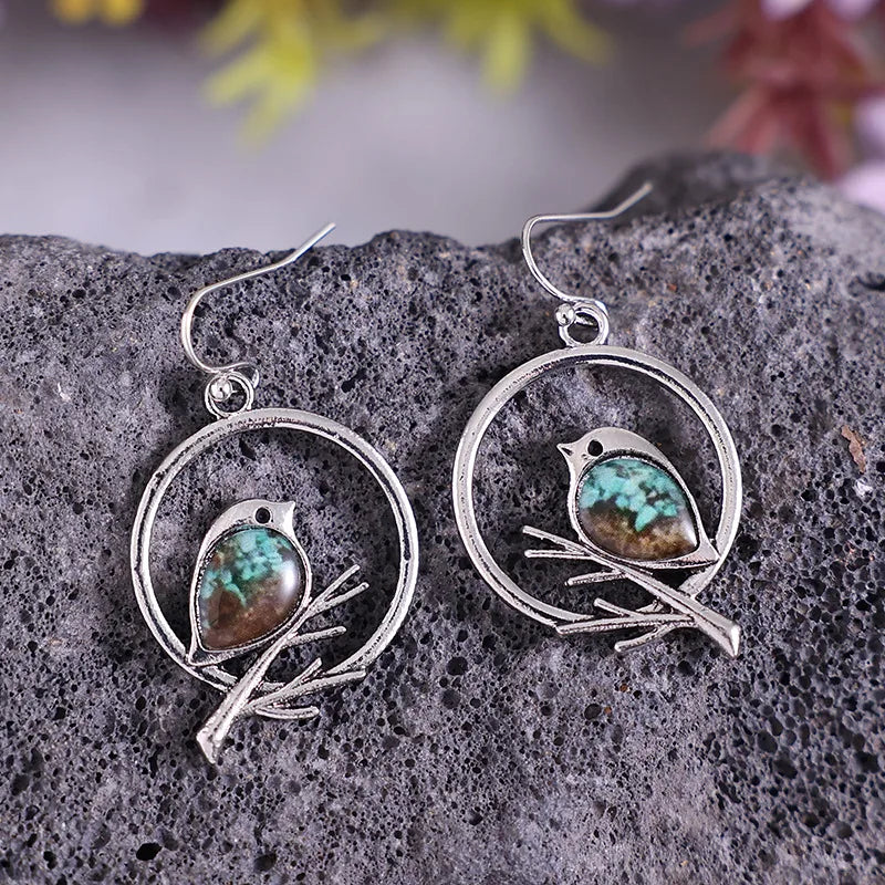 Boucles d'oreilles Oiseau sur Branche Vintage – Symbole de Liberté et de Sérénité